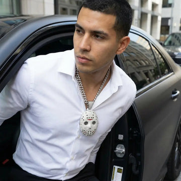 Luxury streetwear styling with iced out hockey mask pendant necklace