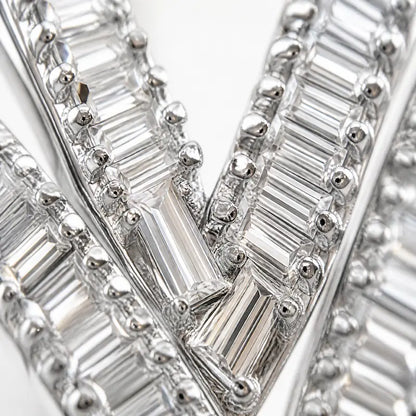 Iced out baguette YVL pendant with moissanite and CZ stones, prong settings, and hip hop style finish - Detail shot
