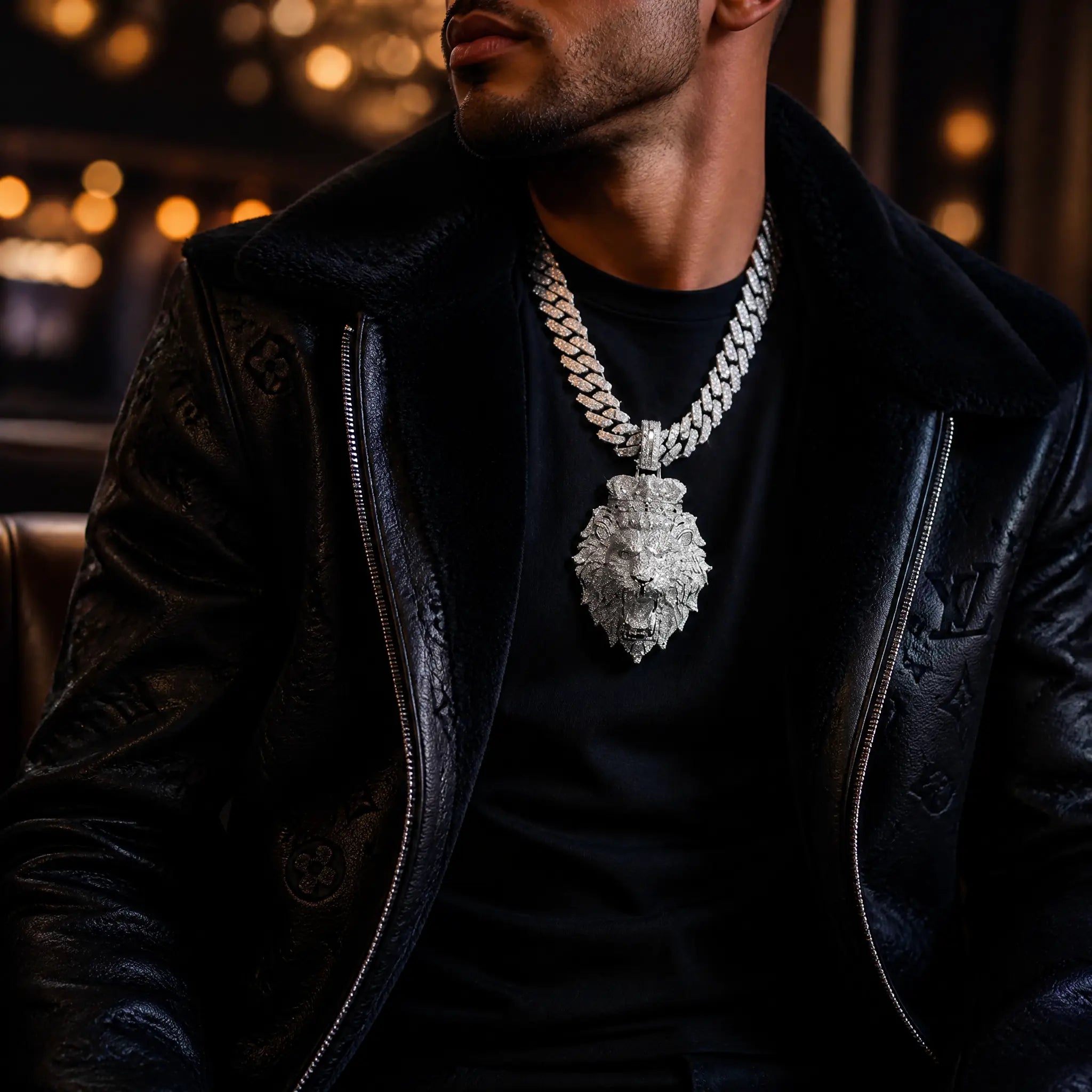 Model wearing iced out lion head pendant necklace